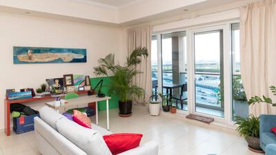 Ms Lambert has spruced up her living area with plants and artwork