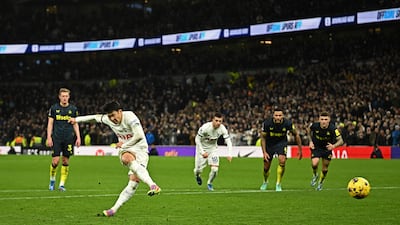Tottenham Hotspur's Son Heung-min scores their fourth goal from the penalty spot. Reuters