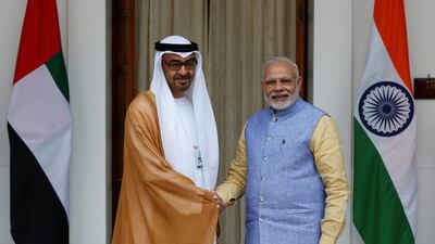 Sheikh Mohammed bin Zayed, Crown Prince of Abu Dhabi and Deputy Supreme Commander of the Armed Forces, shakes hands with India’s prime minister Narendra Modi before their meeting at Hyderabad House in New Delhi on Wednesday. Adnan Abidi / Reuters