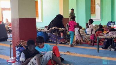 Families rest in a mosque in Wadi Halfa after fleeing Khartoum on their way to Egypt through the Qastul border crossing. Reuters