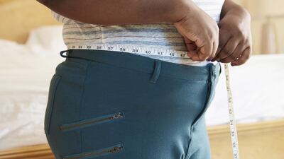 Waistline of 102 centimetres in men and 88cm in women indicate obesity. iStock