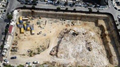 Bulldozers dig the site of the old Phoenician port in Beirut's Mina Al Hosn coastal neighbourhood to lay the ground for a new building.