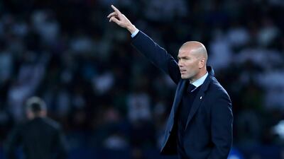 Real Madrid head coach Zinedine Zidane hands out some instructions to his side. Hassan Ammar / AP Photo