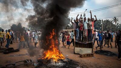 2nd prize, General News Stories: Demonstrators gather on a street in Bangui, Central African Republic, Nov. 17, 2013, to call for the resignation of interim President Michel Djotodia following the murder of Judge Modeste Martineau Bria by members of Seleka. William Daniels, Panos Pictures for Time / AP Photo