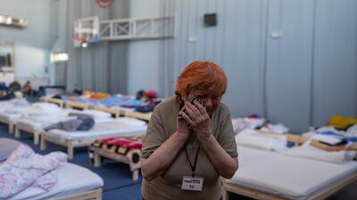 Zinaida Pivtsova, 75, who fled the war in Ukraine, takes shelter in a sports stadium in Przemysl, south-east Poland. AP