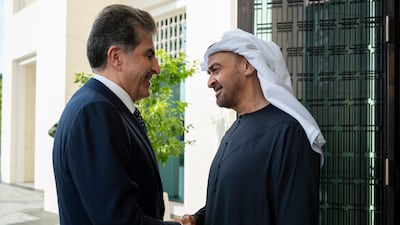 Sheikh Mohamed and Mr Barzani exchange a warm handshake