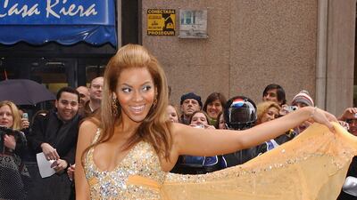 Beyonce, in a tangerine mini, attends the premiere of the new Pepsi advert at Circulo de Belles Artes on February 23, 2005 in Madrid, Spain. Getty Images