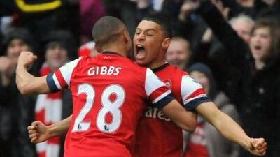 Alex Oxlade-Chamberlain, right, Kieran Gibbs and the rest of their Arsenal teammates have been doing a lot of celebrating as of late.