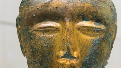 Death customs form part of the conversation between objects in the Grand Vestibule. Shown: a gilded funerary mask from Northern China (907 -1125). Christopher Pike / The National