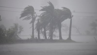 Strong winds and heavy rain have lashed the coastal areas of West Bengal, India. AP