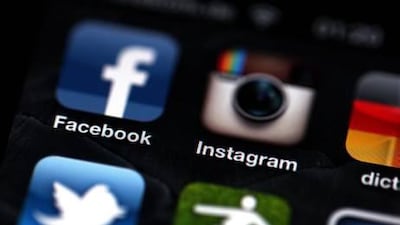 Instagram's new policy allows it to provide information about its users to its parent company, Facebook. Rolf Vennenbrend / EPA