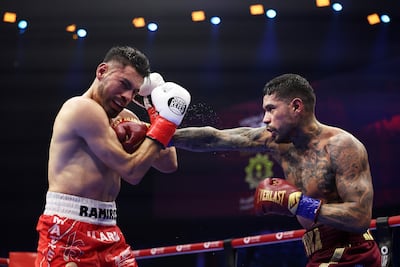 Arnold Barboza, right, punches Jose Carlos Ramirez during their super lightweight fight on the Riyadh Season Latino Night. Getty Images