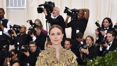 Evan Rachel Wood in a feather cape by Altuzarra. AFP