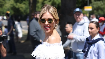 Actress Sienna Miller in a white linen Ralph Lauren dress. PA Wire