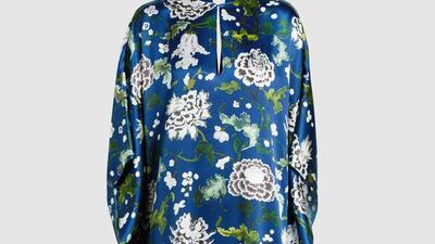 Blue by day: floral-print silk-satin kaftan gown by Adam Lippes; Dh4,960. Courtesy The Modist