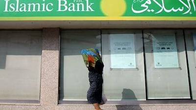 Dubai Islamic Bank reported net profits of Dh301.7 million for the first quarter, representing a 17 per cent increase compared with the same quarter last year. Karim Sahib / AFP