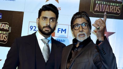 Abhishek Bachchan, left, and Amitabh Bachchan. AFP PHOTO