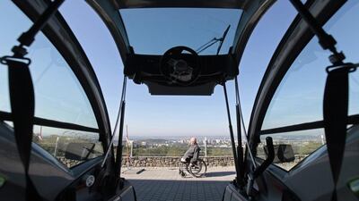 Frantisek Trunda, 67, who lost his legs in 2006, is pictured sitting on a wheelchair in front of his Elbee vehicle in Brno. David W Cerny / Reuters