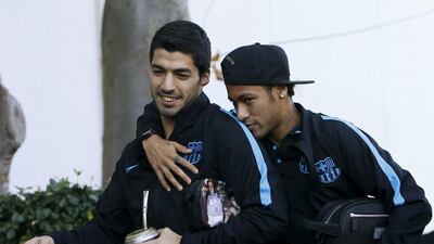 Luis Suarez, left, and Neymar before a training session. Yuya Shino / Reuters