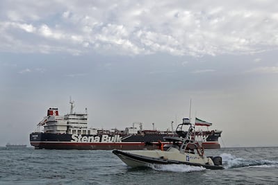 Iranian Revolutionary Guards patrolling around the seized British-flagged tanker Stena Impero in July. European diplomats are meeting in Helsinki to discuss ways to keep shipping safe. AFP