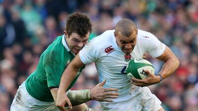 Jonathan Joseph of England is tackled by Peter O’Mahoney of Ireland. Alex Livesey / Getty Images