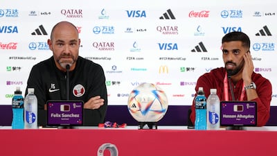 Qatar's Spanish coach Felix Sanchez and forward Hassan Al-Haydos. AFP