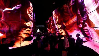 Attendees enter the LG Electronics booth through a tunnel of OLED televisions at CES. Steve Marcus / Reuters