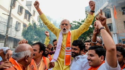 Supporters of the Vishwa Hindu Parishad celebrate after the Indian Supreme Court delivered its verdict on the disputed religious site in Ayodhya on November 9, 2019. AFP