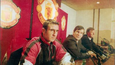 Martin Edwards, centre, is considered responsible for bringing Eric Cantona, left, to Manchester United. Jim Hutchison / ANL / REX / Shutterstock