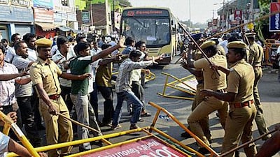Indian Muslim activists protesting against actor Kamal Hassan's controversial spy thriller Vishwaroopam clash with police Madurai, India.