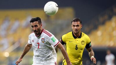 UAE's Ali Mabkhout wins a header. Chris Whiteoak / The National