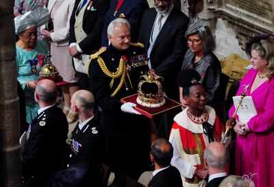 Baroness Floella Benjamin carrying the Sovereign's Sceptre with the Dove during the coronation. PA