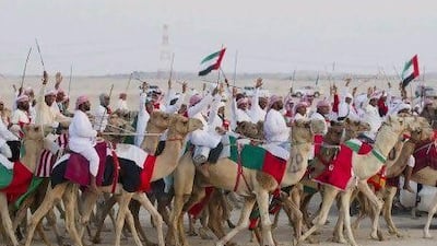 People are buying merchandise from flags and posters to more luxurious items such as limited edition vehicles to celebrate National Day. Philip Cheung / Crown Prince Court - Abu Dhabi