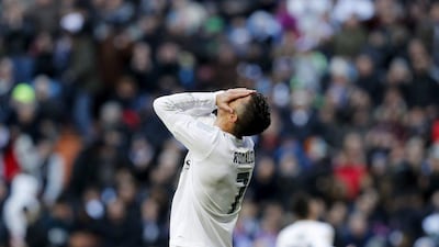 epa05183904 Real Madrid's Portuguese striker Cristiano Ronaldo reacts during the Spanish Liga Primera Division soccer match against Atletico Madrid played at Santiago Bernabeu stadium in Madrid, Spain, 27 February 2016. EPA/Ballesteros
