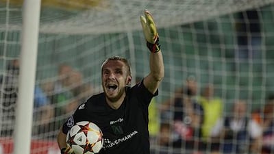 Cosmin Moti, Ludogorets Razgrad’s goalkeeper, celebrates their victory over Steaua Bucharest after penalties in their Uefa Champions League play-off second-leg match in Sofia, Bulgaria. Vassil Donev / EPA