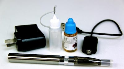 The WHO maintains there is no scientific proof that e-cigarettes help smokers quit may be as or more effective than nicotine patches. David Chang / EPA