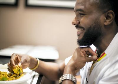 MKO is relishing the Egusi at Kiza Dubai. It is a stew made of grounded melon seeds with chunks of goat meat. za. Photo: Reem Mohammed/The National