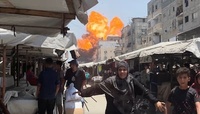 Smoke and flames rise from a house hit by an Israeli strike in Gaza city on June 1. Reuters TV