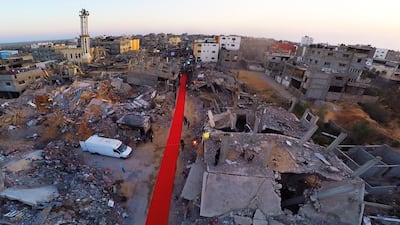 The 60 metre-long red carpet for the Gaza film festival was rolled out through a destroyed suburb of the city in 2015. Gaza Red Carpet Film Festival.