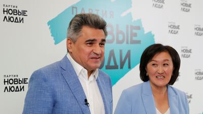 Alexey Nechayev, leader of the New People political party, and his adviser Sardana Avksentieva attend a news conference at the party's headquarters in Moscow. Reuters