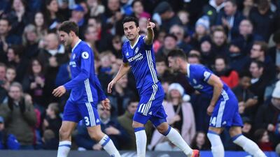 Pedro salutes the crowd after scoring Chelsea’s opening goal. Glyn Kirk / AFP
