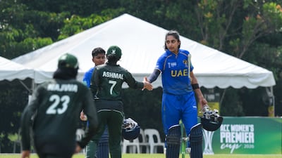 UAE captain Esha Oza shakes hands with Saudi Arabia's Ashmal Hashmi. Photo: ACC