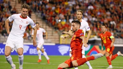 Switzerland's Nico Elvedi, left, and Belgium's Dries Mertens fight for the ball. EPA