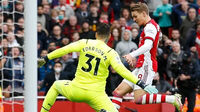 Martin Odegaard - 7: Claimed he should have had penalty after Ederson challenge but referee and VAR felt keeper had won ball. Key player in superb Arsenal first half performance but was sacrificed for defender after Gabriel red card. AFP