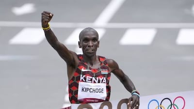 Eliud Kipchoge of Kenya wins the men's marathon.