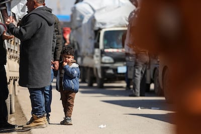 Kurdish people displaced by the violence in Syria prepare to return to their homes. Reuters