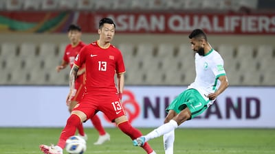 Salman Al Faraj of Saudi Arabia plays the ball forward. Pawan Singh / The National
