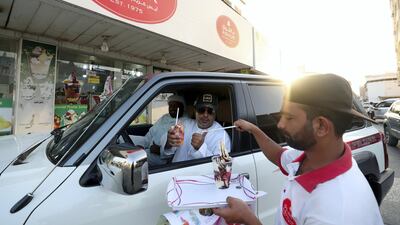 Ice cream is served by waiters at Ashuk ice cream in Ras Al Khaimah. Chris Whiteoak / The National