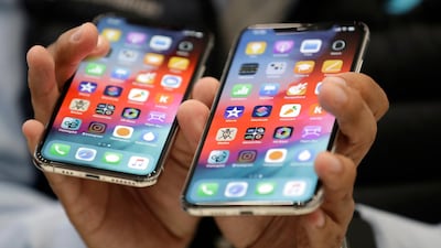 The iPhone XS, left, and XS Max. AP Photo