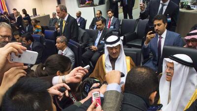 Saudi Arabia’s minister of oil and mineral resources Ali Al-Naimi (lower right) is surrounded by journalists as he attend the 168th Ordinary meeting of Opec at its headquarters in Vienna, on December 4, 2015. Opec members failed to agree new production quotas. AFP
